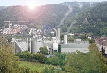 Mit der Fassade aus Betonelementen in Holzoptik und dem Lichtband im Dachbereich erfüllt die neue Heizzentrale die Anforderungen der Stadtbildkommission. Visualisierung: EBL