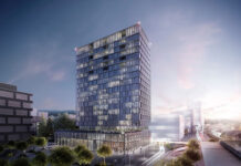 Implenia akquiriert Wincasa Evolus, Winterthur: Abendliche Ansicht der Fassade mit Einblick in die Gewerbeflächen und Wohnungen. Visualisierung: Implenia AG