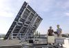 Faltbare Solaranlage: Mehr Strom und Schutz vor Unwetter Armin Buchroithner (rechts) und Thomas Neubauer vom Institut für Elektrische Messtechnik und Sensorik der TU Graz neben der FLAPTrack-Demonstrationsanlage. Foto: Helmut Lunghammer/TU Graz